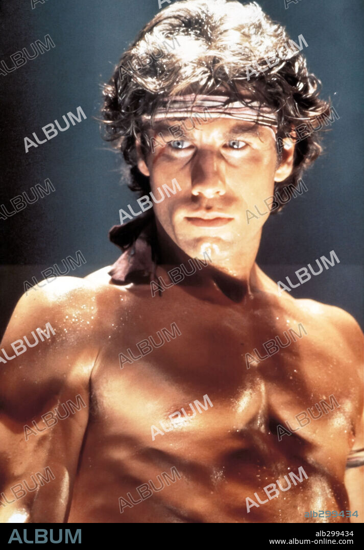 TRAVOLTA JOHN. JOHN TRAVOLTA in STAYING ALIVE, 1983, directed by SYLVESTER STALLONE. Copyright PARAMOUNT PICTURES.