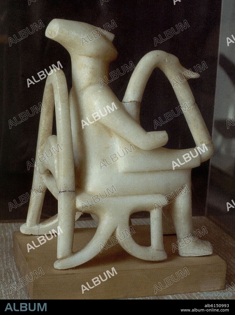 IDOLO CICLADICO DE KEROS - TAÑEDOR DE LIRA O DE ARPA - 2600 AC - ALTURA 22,5 cm.