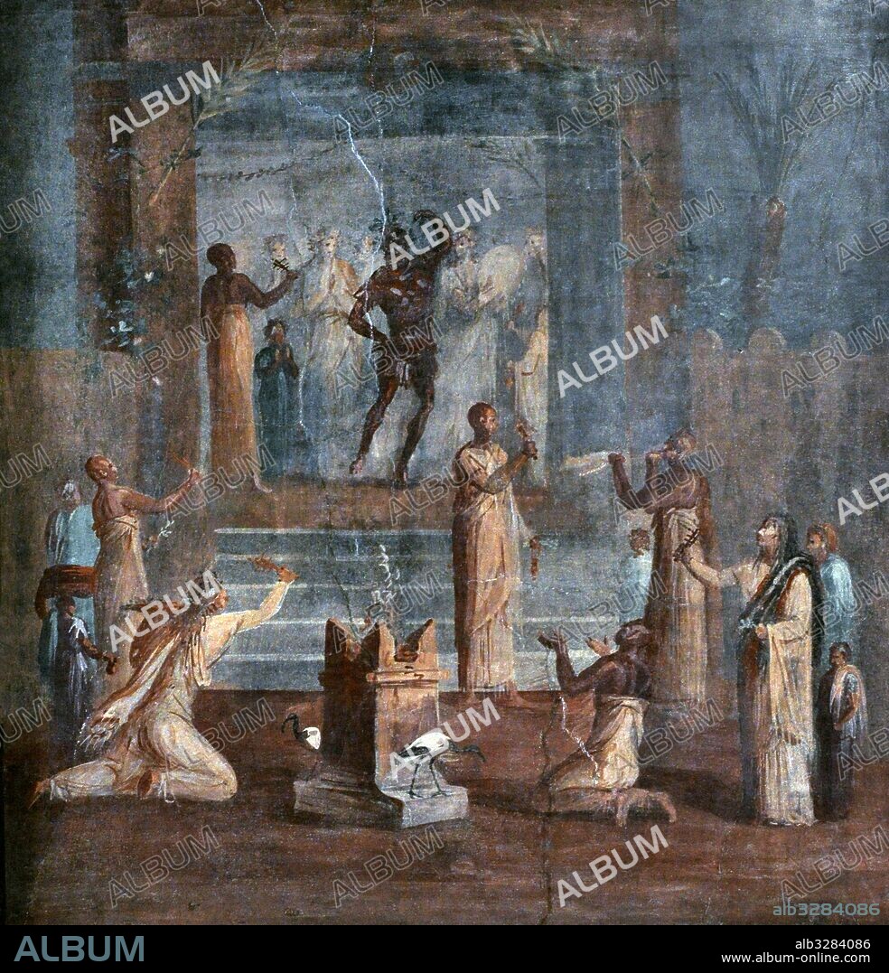 Fresco romano. Ceremonia de culto en el templo de Isis. Se pueden ver palmeras, esfinges e ibis, elementos de origen egipcio como la diosa. Un sacerdote disfrazado de dios Bes realiza una danza ritual. Procedente de Herculano, 50-79 d. C, cerca del teatro. Museo Arqueológico Nacional. Nápoles. Italia.