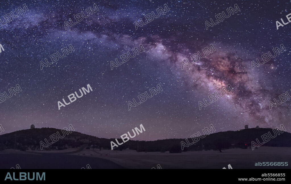 The summer Milky Way rises over the McDonald Observatory near Fort Davis, Texas.