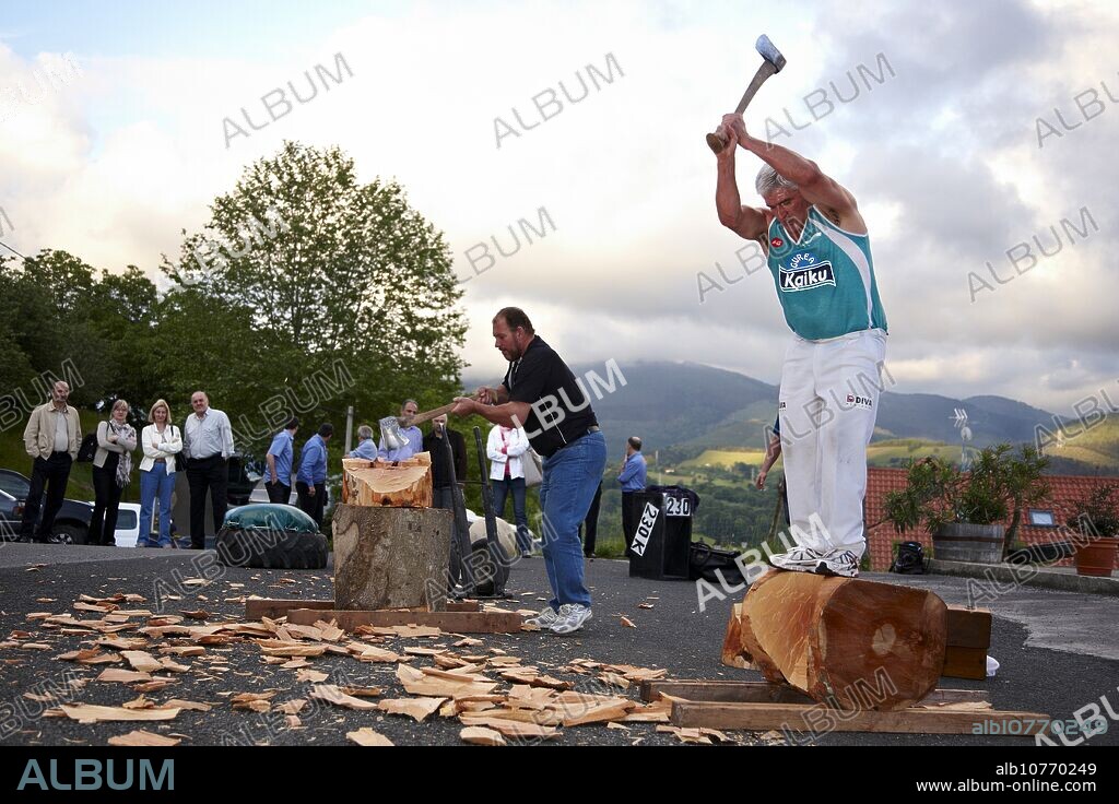 Luis Txapartegi, Aizkolari (wood-chopping), and Iñaki Perurena, Basque rural sport, Aduna, Gipuzkoa, Basque Country, Spain.