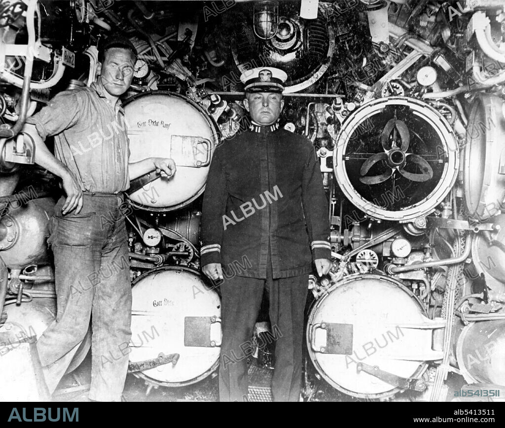 SM UB-88 (German submarine) interior view of the forward torpedo room, looking forward, taken September 24, 1919 while in U.S. Navy service. The four torpedo tubes are 50-CM. (19.7-inch) diameter and each carries the motto Gott Mit Uns (God with us) on the breech. Note the open door on the upper right tube with the torpedo tail visible. UB-88 was surrendered to the United States on November 26, 1918 in accordance with the requirements of the Armistice with Germany.  (cropped and cleaned).