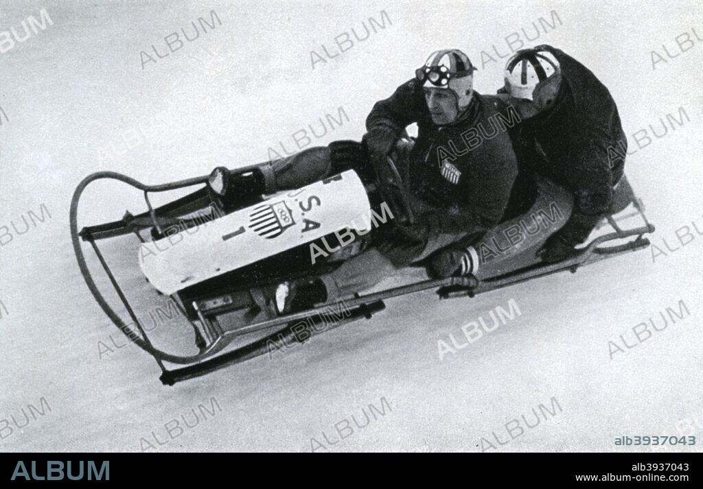 American two man bobsleigh team, German winter olympic games, 1936. Ivan Brown and Alan Washbond in action on their way to winning the gold medal. A print from Olympia 1936, Die Olympischen Spiele 1936, Volume I, Cigaretten-Bilderdienst, Hamburg, 1936.