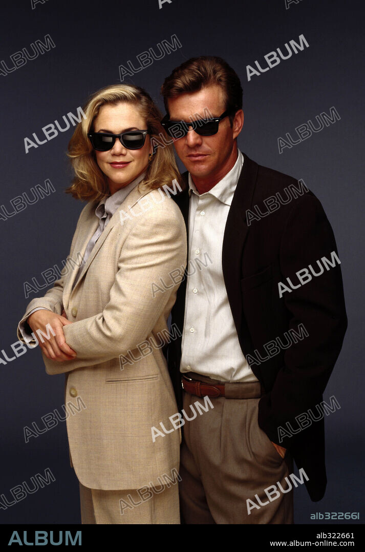 DENNIS QUAID and KATHLEEN TURNER in UNDERCOVER BLUES, 1993, directed by HERBERT ROSS. Copyright M.G.M.
