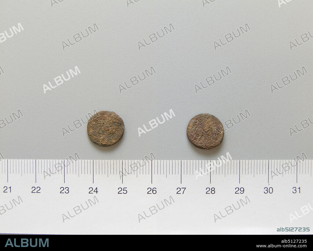 Ruler: Caracalla, Roman Emperor, A.D. 188217, ruled A.D. 198217, Ruler: Abgar IXMint: Edessa, Mesopotamia, Coin of Caracalla, Roman Emperor; Abgar IX from Edessa, Mesopotamia, A.D. 21214, Copper, 1.21 g, 6:00, 12.3 mm, Made in Edessa, Mesopotamia, Roman, 3rd century A.D., Numismatics.