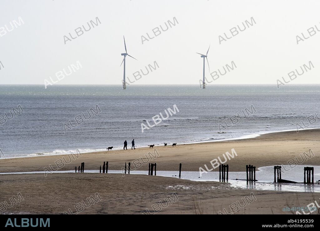 Wind Turbines, Blyth Offshore Wind Farm, Northumberland, 2010. View across the beach towards two wind turbines that are part of the wind farm.