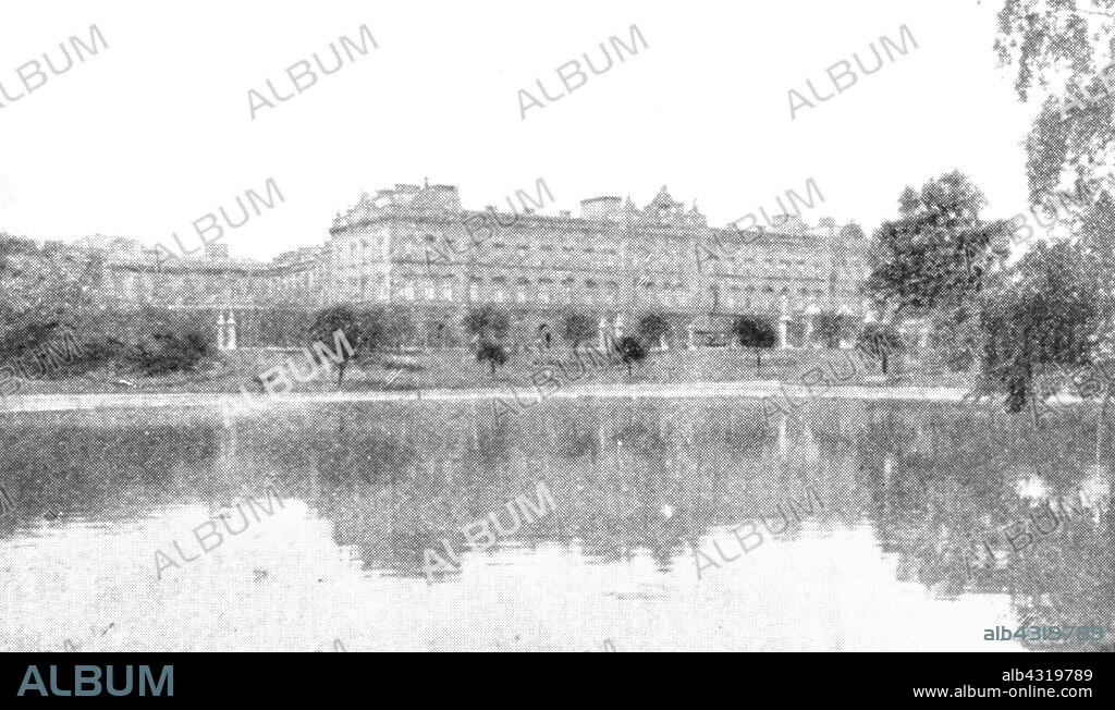 'Buckingham Palace at the time of Victoria', (1901). View of Buckingham Palace in London, viewed across an ornamental lake during the reign of Queen Victoria (1837-1901). Acquired by George III in 1761 for his wife, Queen Charlotte, Buckingham Palace became the official royal London residence in 1837 when Queen Victoria moved in shortly after her accession to the throne. From "The Illustrated London News Record of the Glorious Reign of Queen Victoria 1837-1901: The Life and Accession of King Edward VII. and the Life of Queen Alexandra". [London, 1901].