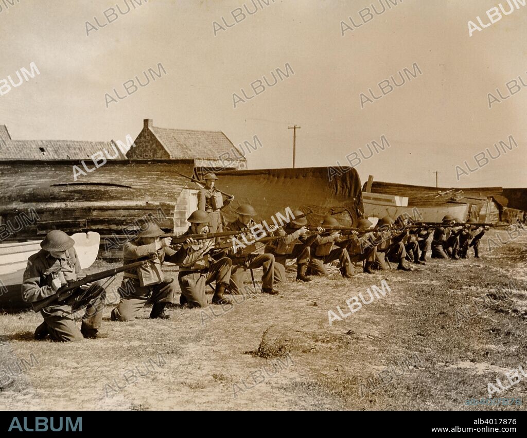 Holy Island fishermen Home Guards rifle practice, Lindisfarne, Northumberland, World War II, 1942. The Home Guard was a volunteer force made up of men who were ineligible for service in the regular army. Originally organised in 1940 as the Local Defence Volunteers (LDV), its purpose was to assist in the defence of Britain in the event of a German invasion. The Home Guard was stood down in December 1944 and formally disbanded a year later.