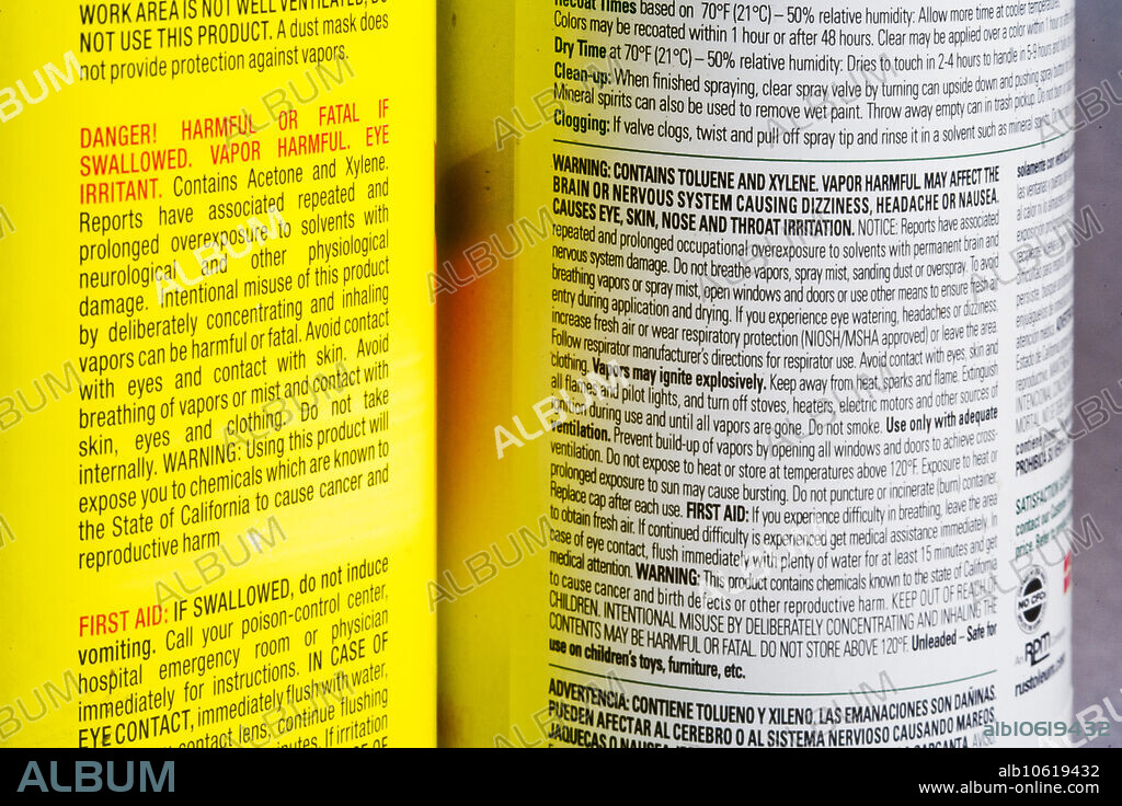 Warning labels on a cleaning solvent car (left) and an aerosol paint can warn users of the danger of inhaling fumes from these products.
