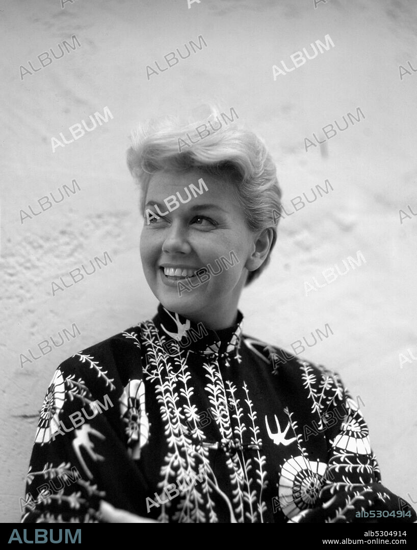 DORIS DAY. Circa 1956, Hollywood, California, USA: American actress and Hollywood Icon DORIS DAY during a shoot on a Hollywood backlot with 'The Man Who New Too Much' co-star James Stewart (not shown.