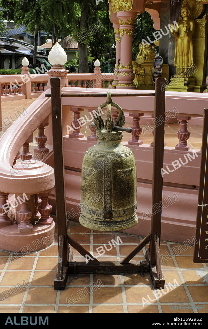 Bangkok, Samut Prakan, Thailand, Southeast Asia, Asia. Erawan Museum. Phra Ket Chulamanee Chedi was built to represent Phra Ket Chulamanee, an angel on the heaven who has very long hair. An ancient bell in front of the temple.