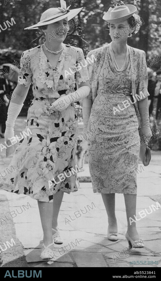 Duchess of Kent Attends Garden Party -- The Duchess of Kent this afternoon attended garden party organised by Lady Zia Wernher at Someries House, Regent's Park, in connexion with a Christmas Market to be held at Seymour Hall on Nov. 22 next in aid of ***** funds of University College Hospital.The Duchess of Kent walking with Lady Zia Wernher, on arrival at the party. July 4, 1939. (Photo by Keystone).