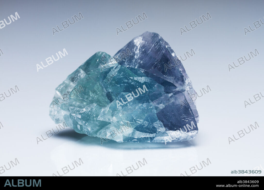 Fluorite specimen. Fluorite is a halide mineral composed of calcium fluoride (CaF2). Fluorite is defined to have hardness of 4 in the Mohs scale.