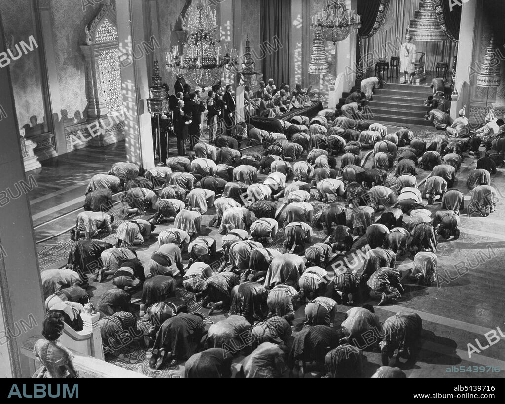 A Twentieth Century Fox Picture. Darryl F. Zanuck Presents Irene Dunne, Rex Harrison Linda Darnell in "Anna and the King of Siam" with Lee J. Cobb, Gale Sondergaard, Mikhail Rasumny, Dennis Hoey, Tito Renaldo, Richard Lyon. Directed by John Cromwell, Produced by Louis D. Lighton. May 23, 1953. (Photo by Twentieth Century-Fox);A Twentieth Century Fox Picture. Darryl F. Zanuck Presents Irene Dunne, Rex Harrison Linda Darnell in "Anna and the King of Siam" with Lee J. Cobb, Gale Sondergaard, Mikha.