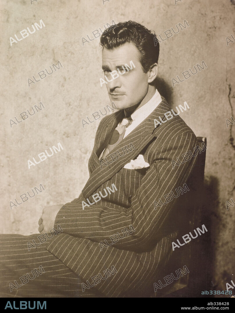 GILBERT ROLAND.