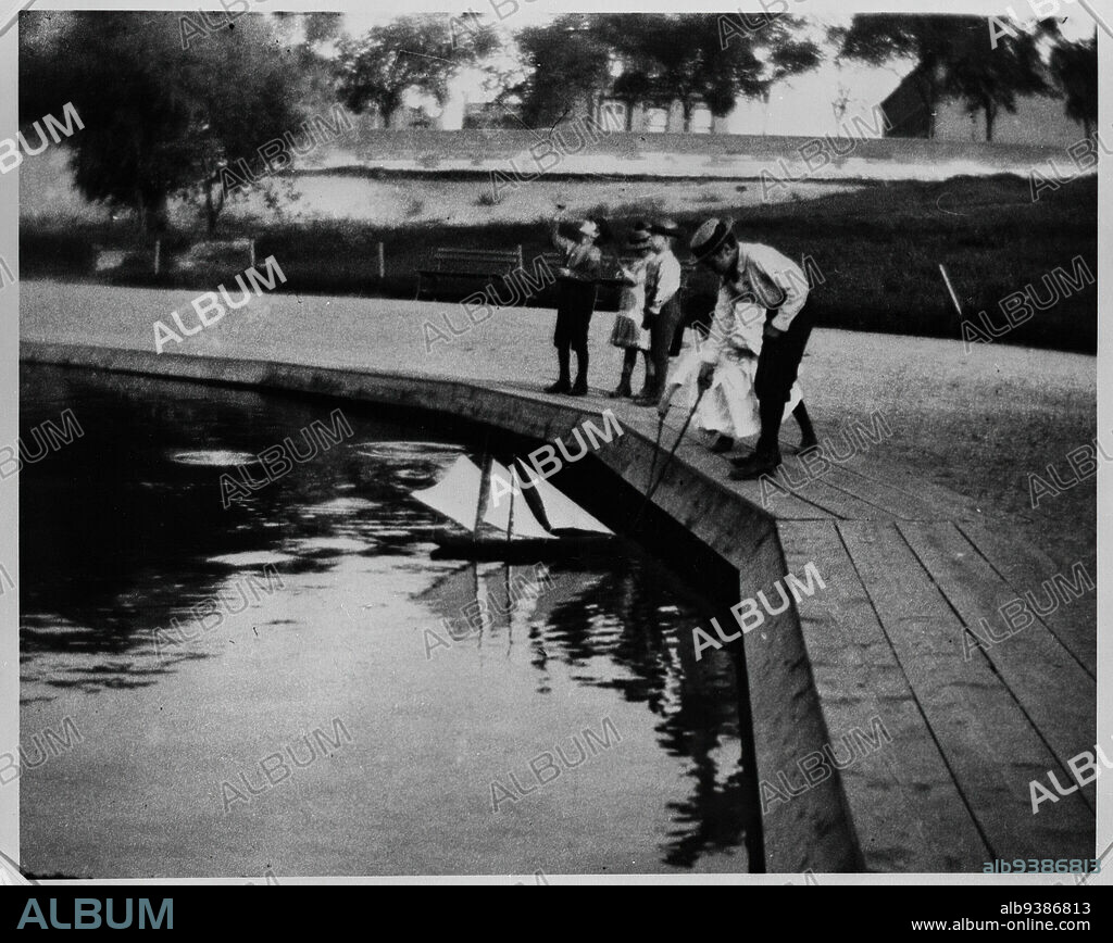 Sailing Boats, Central Park, Manhattan, George Bradford Brainerd, American, 1845-1887, Gelatin silver photograph, 1885, 7 15/16 x 9 13/16 in., 20.1 x 25 cm, children, miniature, New York City, nyc, olmstead, play, pool, recreation, toys, urban, vintage photograph.