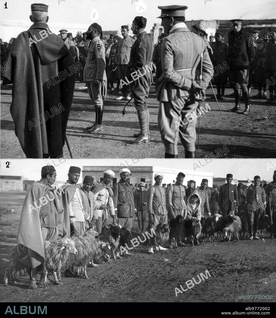 Febrero 1922. Melilla. En el campamento de Nador. 1.-el teniente coronel Núñez de Prado (A), jefe de los Regulares de Melilla, número 2, Dirigiendo la palabra A sus Soldados por mediación del Intérprete, Caid Sidi Mohamed ben Rahal 2.-Algunos de los Regulares con los Borregos que les Correspondieron del lote regalado por S.M. la Reina.