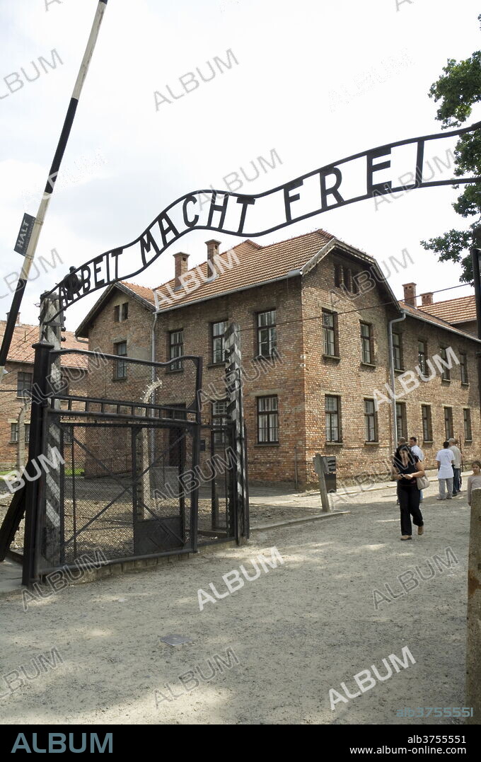 Entry gate with sign Arbeit Macht Frei (work makes you free), Auschwitz Concentration Camp, UNESCO World Heritage Site, Oswiecim, near Krakow (Cracow), Poland, Europe.