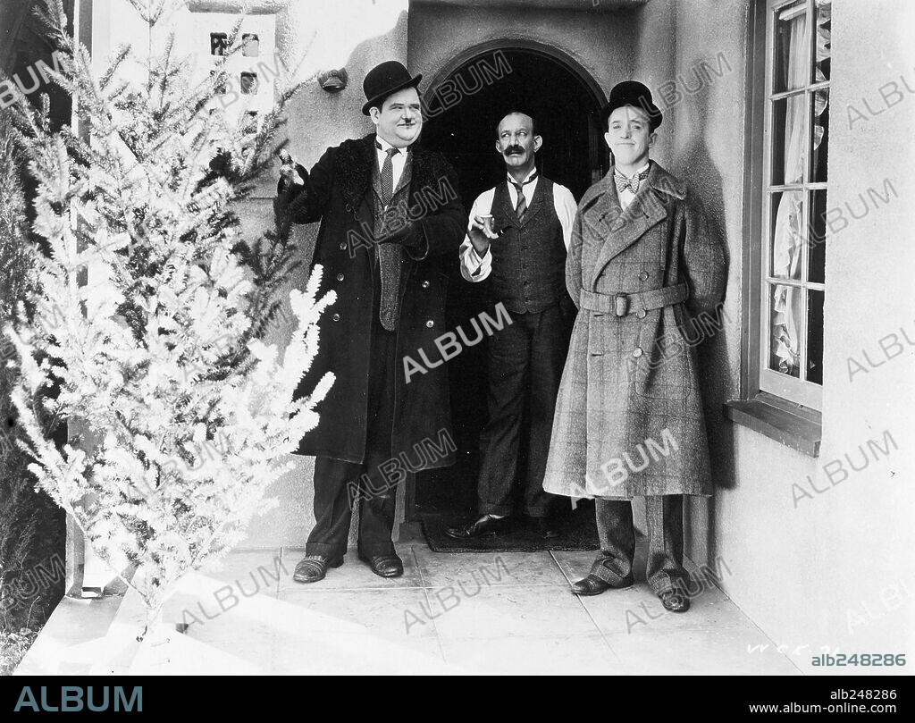 JAMES FINLAYSON, OLIVER HARDY and STAN LAUREL in BIG BUSINESS, 1929, directed by JAMES W. HORNE. Copyright M.G.M.