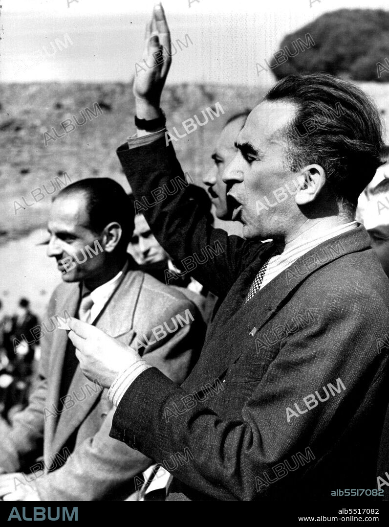 Italian Leaders Asks For Elections.Luigo Longo, (standing on Rostrum), communist leader and former partisan commander in North Italy, addresses 20,000 in the stadium of Domitian on Palatine hill, Rome, Italy, Oct. 14. He asked for immediate elections in Italy to foster democracy and start the nation on the reconstruction road. October 21, 1945. (Photo by Associated Press Photo).