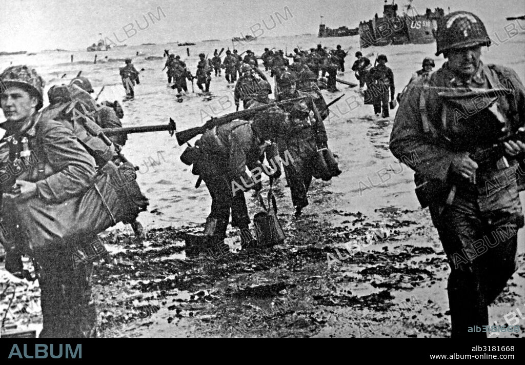 American soldiers go ashore during the Normandy landings.  landing operations on Tuesday, 6 June 1944 (termed D-Day) of the Allied invasion of Normandy in Operation Overlord during World War II.