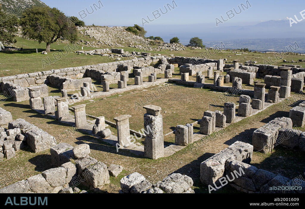 Kassope was founded at the beginning of the 4th century BC, possibly as a consolidation of smaller rural villages. It is a splendid example of a city based on the Hippodamian grid plan. The city walls enclose a grid plan of city blocks. The paved roads, often featuring drains for rainwater, were built in steps. The city features a vast agora, ruins of the bouleuterion, a katagogion (360-350 BC) and a theater (300-250 BC).