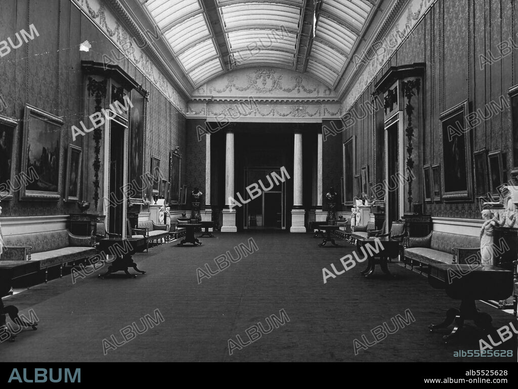 First Interior Pictures Of Buckingham Palace - The Royal Picture Gallery at the Palace. Priceless works of Rubens, Rembrandt, etc., are hung here.
Only a privileged few have seen the beautiful interior of Buckingham Palace, London, home of British Royalty. These pictures, taken by special permission of Their Majesties, give a glimpse of the Royal Apartments which probably will be used next November when Princess Elizabeth weds Lieut. Philip Mount batten. Famous art treasures, period furniture and rare paintings, beyond price, decorate every corner of the historic rooms. August 21, 1947. (Photo by Fox).
