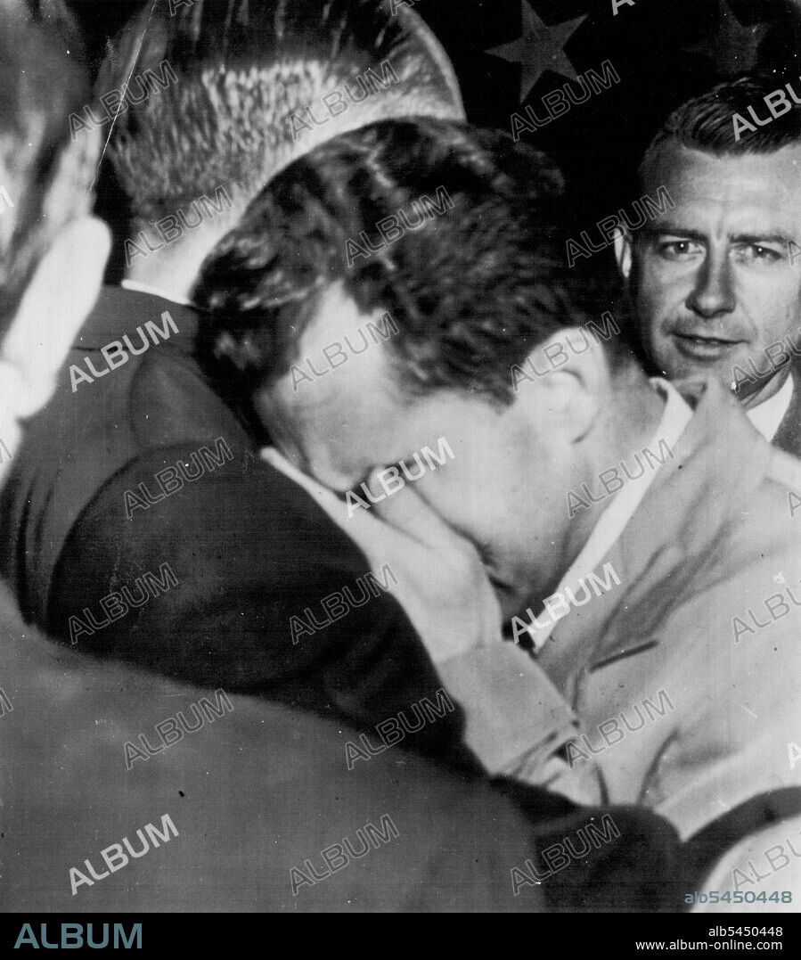 Nixon Breaks Down -- Sen. Richard M. Nixon puts his hands to his face as he breaks down on the shoulder of Sen. William Knowland of California, after completing his speech before Eisenhower rally here tonight. Nixon flew here to meet Gen Dwight Eisenhower. After an emotional television defense of his former financial affiliations, Nixon  breaks down, cries. September 24, 1952. (Photo by AP Wirephoto).