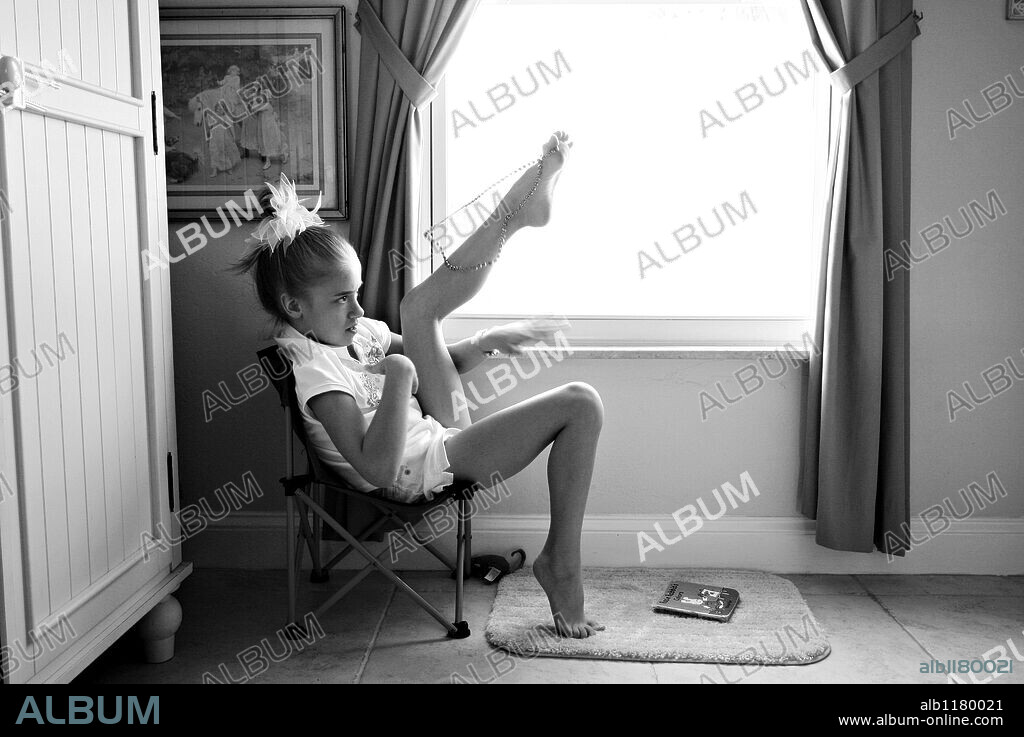 DANI LIEROW. No one has any way of telling what lies behind Dani's big brown eyes and vacant stare. For the first seven years of her life, Danielle never saw the sun, felt the wind or tasted solid food. She was kept in a closet in a Plant City apartment, cloistered in darkness, left in a dirty diaper, fed only with a bottle. "She was a ferral child," said Carolyn Eastman of the Tampa heart Gallery. "We'd never seen a case like that." PICTURED - Feb 03, 2008 - Fort Myers, Florida, USA - While watching an educational cartoon video, Dani, 9, engages in stimming behaviors, like batting at a string of plastic beads that she swings from her toes. Experts said that due to a lack of socialization and stimulation the first, and most important, three years of her life, she developed "environmental autism," and while born normal, she now exhibits a lot of traits similar to those born with autism. (Credit Image: Â© Melissa Lyttle/St. Pete Times/zReportage.com/ZUMA Press) RESTRICTIONS: * Tampa Tribune and USA Tabloids Rights OUT *. 11/08/2008