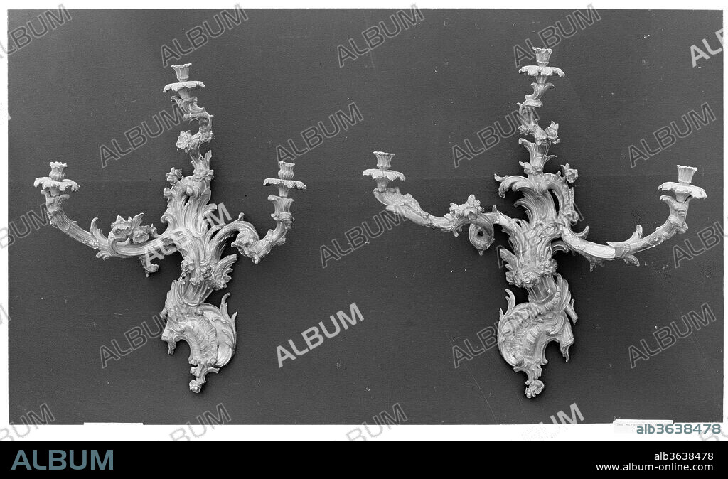 Wall light (candelabrum appliqué) (one of a pair). Culture: French. Dimensions: Overall: 36 × 32 3/4 × 12 1/2 in. (91.4 × 83.2 × 31.8 cm). Date: ca. 1735.