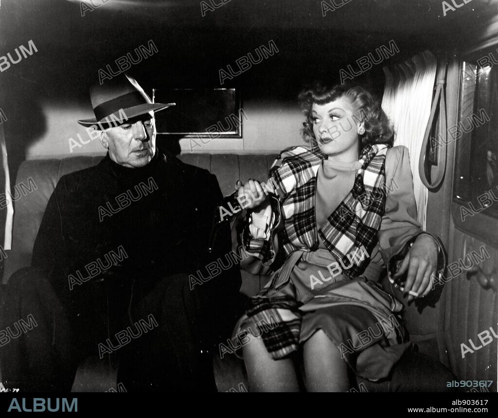 CEDRIC HARDWICKE and LUCILLE BALL in LURED, 1947, directed by DOUGLAS SIRK. Copyright UNITED ARTISTS.