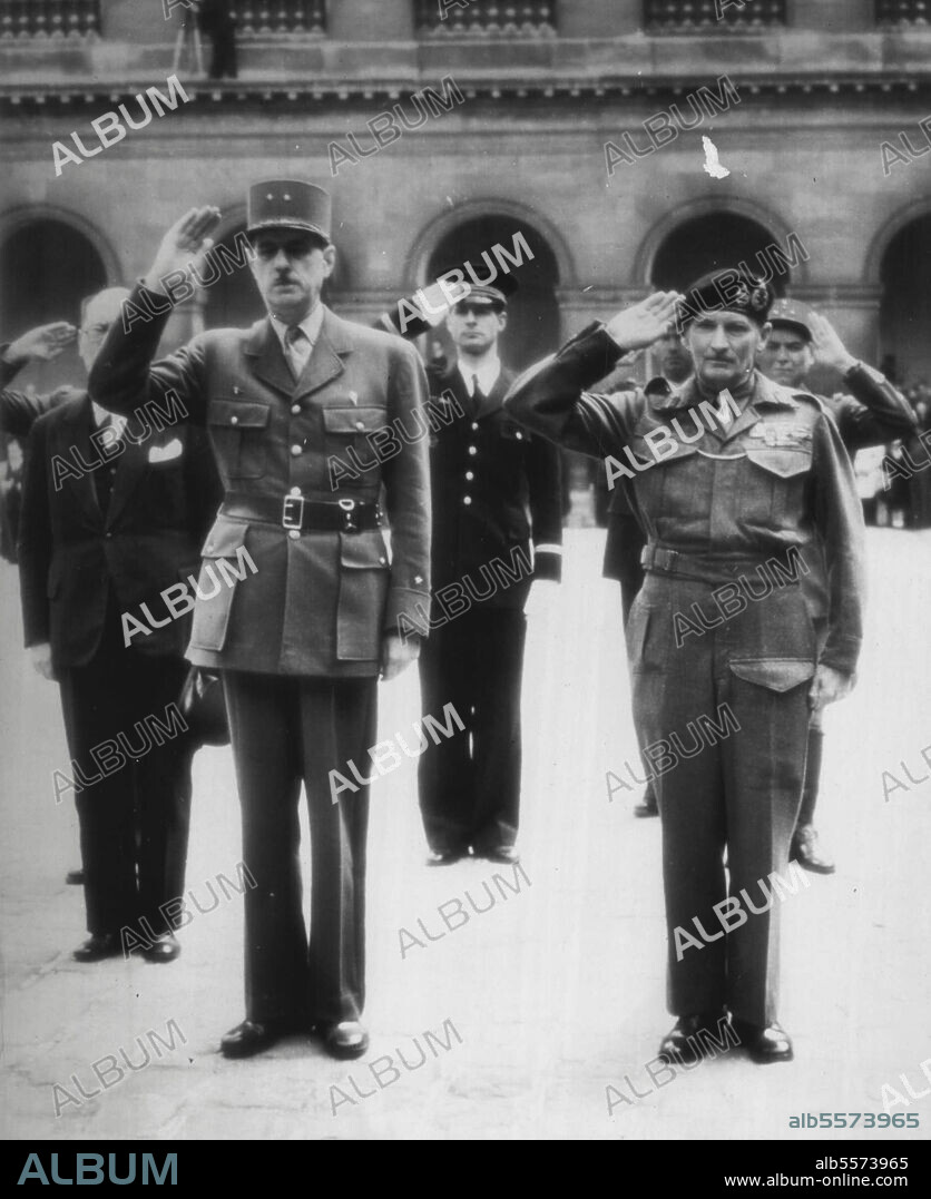 Montgomery Is Decorated By France -- General Charles De Gaulle (Left) and Field Marshal Sir Bernard L. Montgomery Salute during the ceremony at the Invalids, Paris, in which the British commander was invested with the Grand Cross of the Legion of Honor by Gen. De Gaulle. This photo was taken by Henry L. Griffin, Associated Press Photographer with the Wartime still picture pool. May 30, 1945. (Photo by AP Wirephoto).
