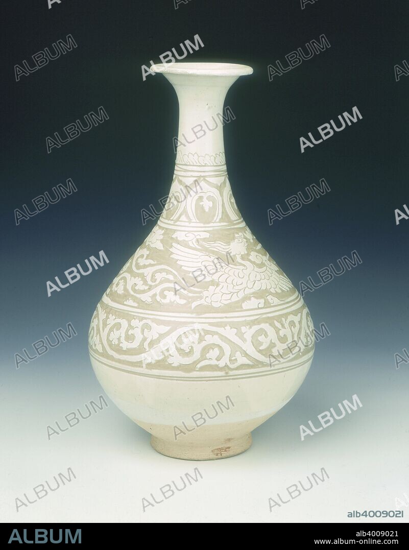 Cizhou type sgraffito Yuhuchun vase with two phoenixes, early Yuan dynasty, China, late 13th-early 14th century. A Cizhou stoneware pear-shaped vase with bulbous body, long neck and everted lip of typical yuhuchun shape. The vase is decorated in the central horizontal section with two phoenixes among clouds, one has a five-streamer ribboned tail and the other has a two-streamer clobbered classic scroll tail. The top section has a stylised lotus petal pattern border and the bottom section a clobbered classic scroll border all done in sgraffito technique, in which the vase is carved through the white slip to the buff body and then covered by a transparent glaze. The foot and base are unglazed, showing the buff body. The depiction of phoenixes with differing tails as here seems a common feature in the Yuan period.