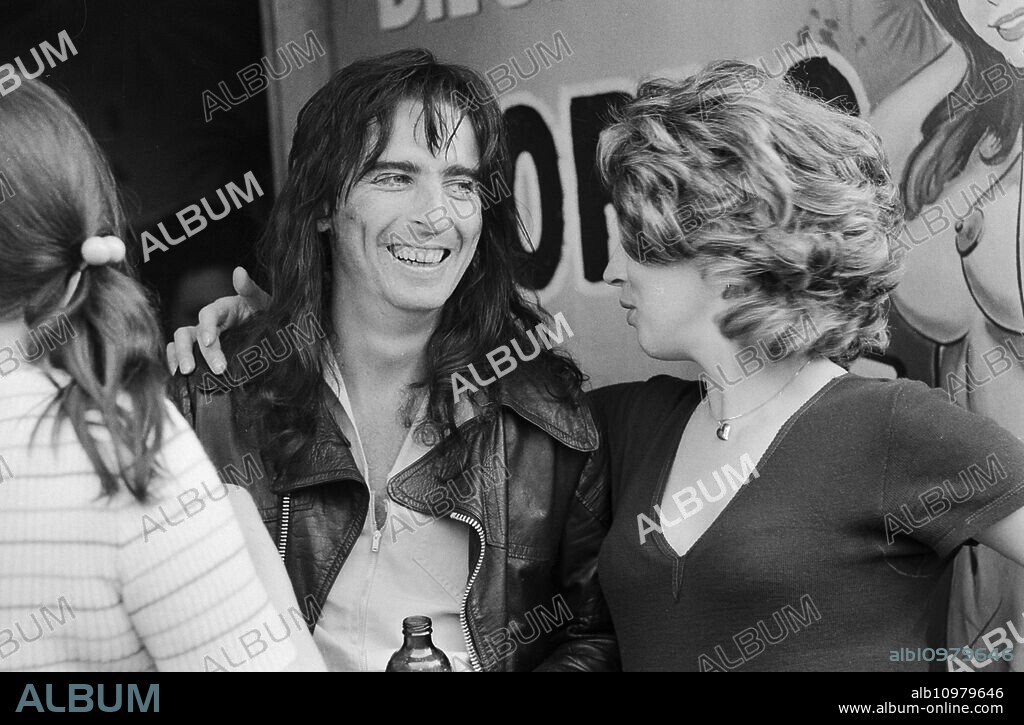 American rock singer Alice Cooper with fans after a concert at Hamburg Reeperbahn, Germany 1970s.