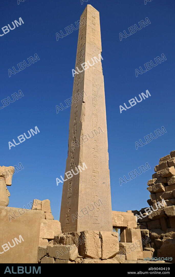 obelisk of Hatshepsut at Karnak Temple Complex, in Luxor, Egypt. Construction at the complex began during the reign of Senusret I in the Middle Kingdom and continued into the Ptolemaic period, although most of the extant buildings date from the New Kingdom. The area around Karnak was the main place of worship of the eighteenth dynasty Theban Triad with the god Amun as its head. It is part of the monumental city of Thebes.