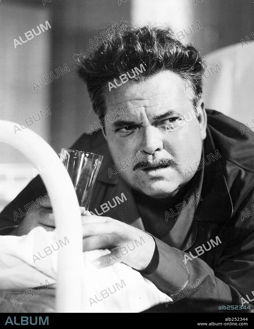 ORSON WELLES in THE ROOTS OF HEAVEN, 1958, directed by JOHN HUSTON. Copyright 20TH CENTURY FOX.