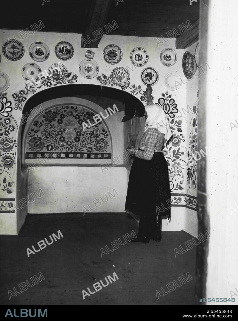 Slovakian Village.The entrance of each house in the Village of Slovensky Grob consists of an arched hallway which is always spotlessly clean and decorated with local pottery. December 14, 1946. (Photo by Wide World Photos).
