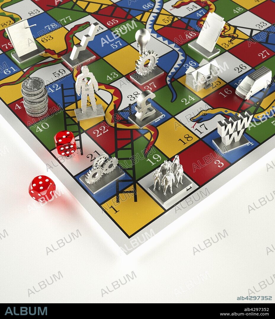 Tokens and dice on Snakes and Ladders game.