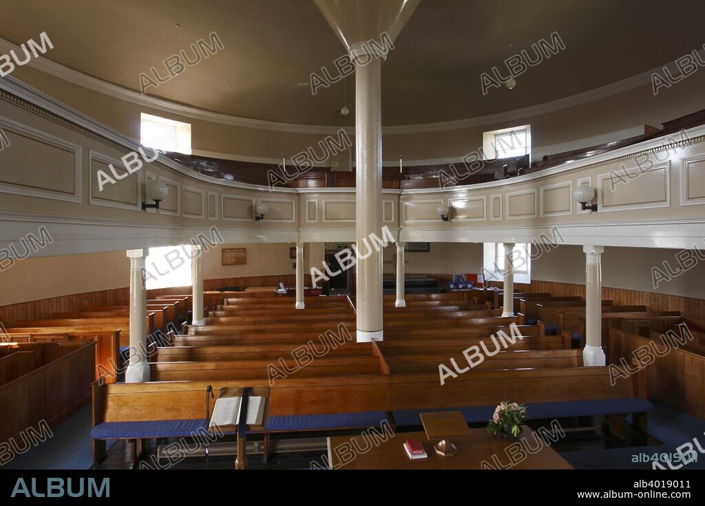 Bowmore Round Church, Islay, Argyll and Bute, Scotland. Kilarrow Parish Church in Bowmore was built in the 1760s. It is said that it was built to a circular design to ensure that there would be no corners for the devil to hide in. The roof of the building is supported by a single massive pillar.