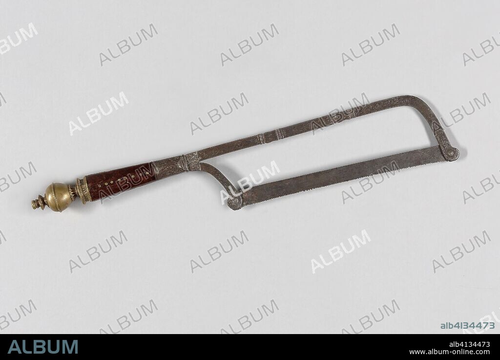 Bone Saw from a Hunting Trousse. France. Date: 1501-1600. Dimensions: 36.8 cm (14 1/2 in.). Steel, brass, and fruitwood. Origin: France.