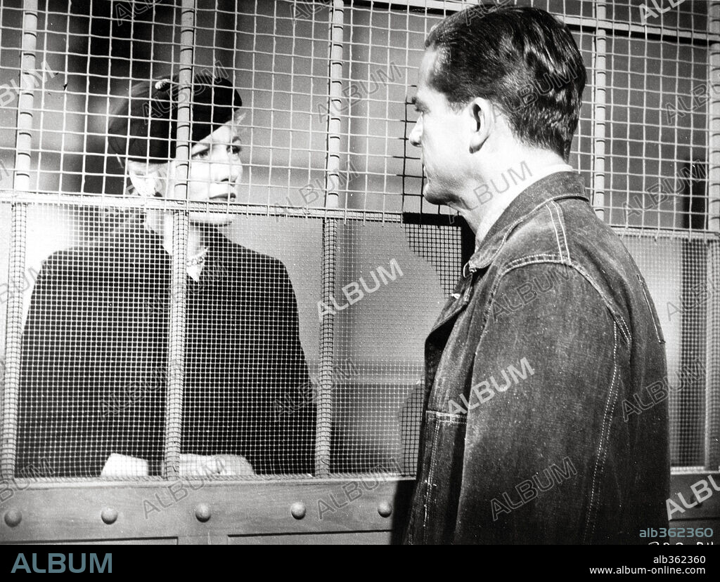 DANA ANDREWS y JOAN FONTAINE en MÁS ALLÁ DE LA DUDA, 1956 (BEYOND A REASONABLE DOUBT), dirigida por FRITZ LANG. Copyright RKO.