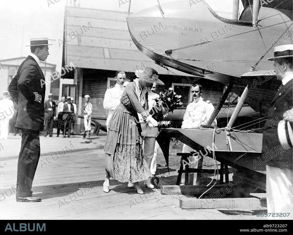 August 1916. Christening of an airplane in New York. Mad. Vincent Astor Baptizing the new Hydroplane with Champagne, given by Distinguished Personalities to the second battalion of the New York Naval Militia.