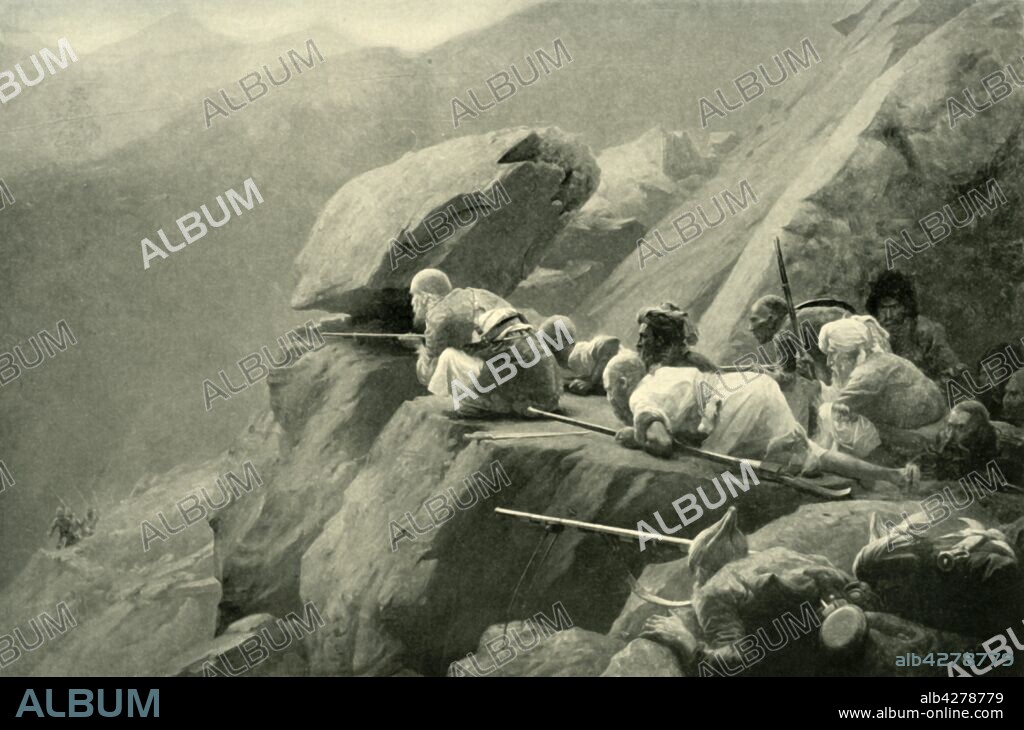 'An Ambuscade', (1901). Ambush during the Second Afghan War, Afghanistan, in 1878: local fighters lie in wait for British forces. After a painting made late 19th-early 20th century. From "The Life and Deeds of Earl Roberts, Vol. II. - To The Abdication of Yakub Khan", by J. Maclaren Cobban. [T. C. & E. C. Jack, Edinburgh, 1901].