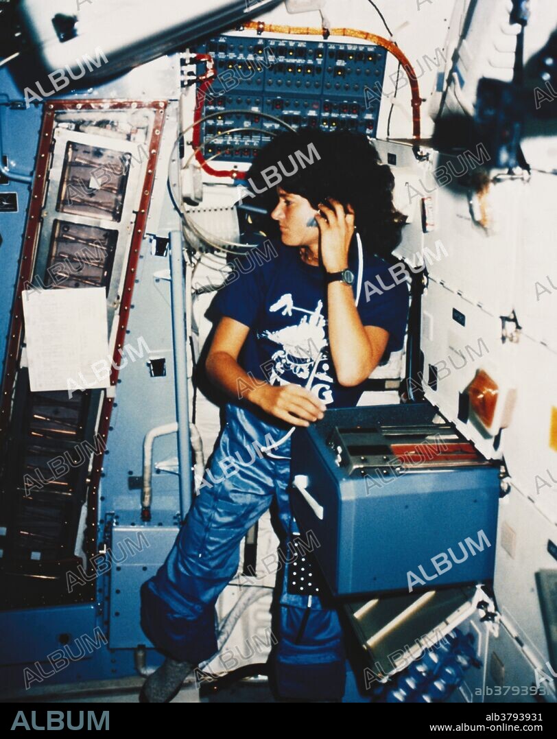 Astronaut Sally K. Ride aboard the Space Shuttle Challenger, during Mission STS-7, June18-24, 1983. Sally Kristen Ride (May 26, 1951 - July 23, 2012) was an American physicist and astronaut. Ride joined NASA in 1978 and, at the age of 32, became the first American woman in space and still remains the youngest American astronaut to travel to space. After flying twice on the space shuttle Challenger, she left NASA in 1987. She worked for two years at Stanford University's Center for International Security and Arms Control, then the University of California, San Diego as a professor of physics, primarily researching non-linear optics and Thomson scattering. She served on the committees that investigated the Challenger and Columbia space shuttle disasters, the only person to participate on both. She died in 2012, at the age of 61, seventeen months after being diagnosed with pancreatic cancer.