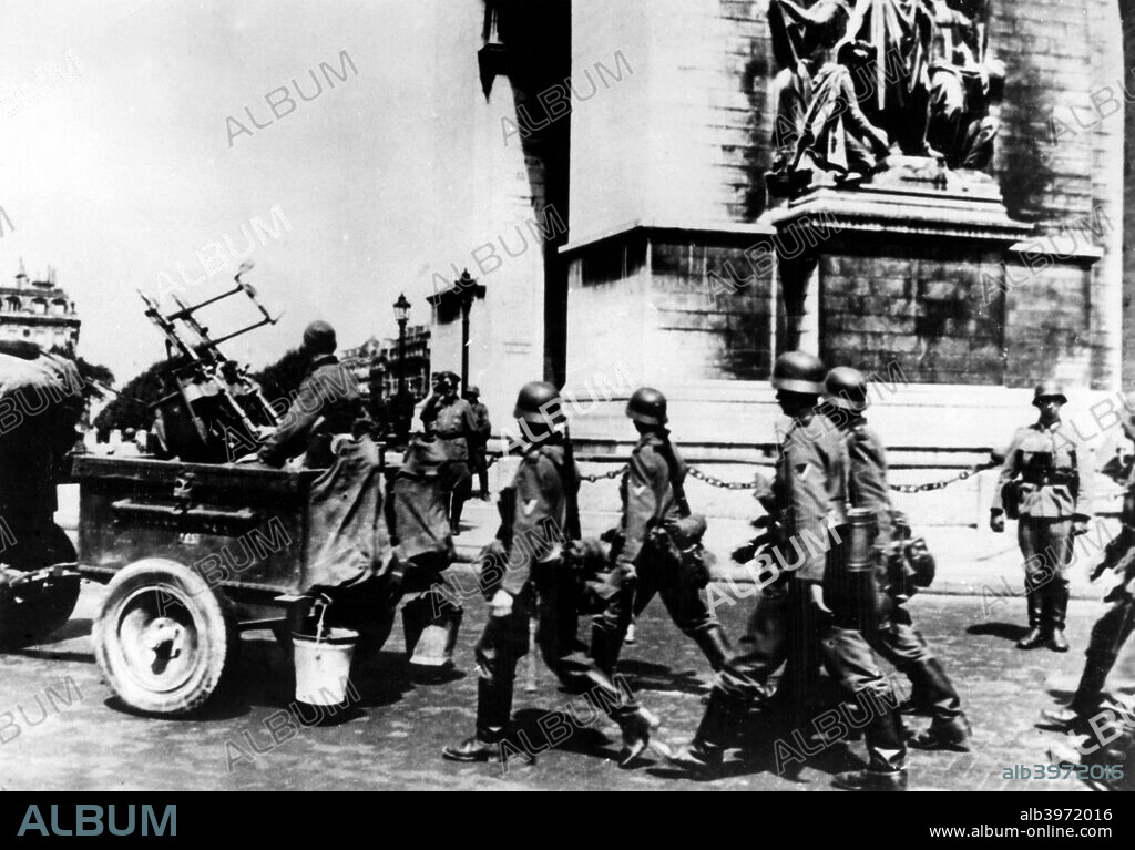German troops marching past the Arc de Triomphe, Paris, June 1940.