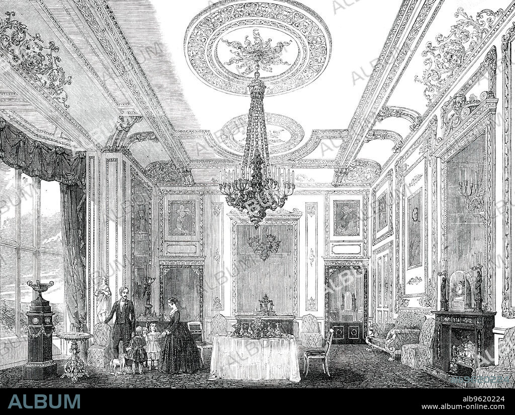 The White Drawing-Room, Windsor Castle, 1850. 'The White Drawingroom is a noble room, with a spacious bay window reaching from the floor to the ceiling, and it is frequently used as a breakfast-room by her Majesty...the walls...are painted white, the whole of the ornamental details on the walls and ceiling being richly gilded. The two doors at the south side of the room...are...of ebony, with enrichments of ormolu. Large plates of looking-glass are in the doors, and also over the fire-place...The draperies to the window are of crimson satin damask...In the bay of the window, on a tall pedestal of black marble of classic design, is an elegant vase of malachite, mounted in ormolu; and immediately in front of the pedestal is a table of most beautiful workmanship...The chandelier is a massive and somewhat heavy-looking one, for forty lights'. From "Illustrated London News", 1850.