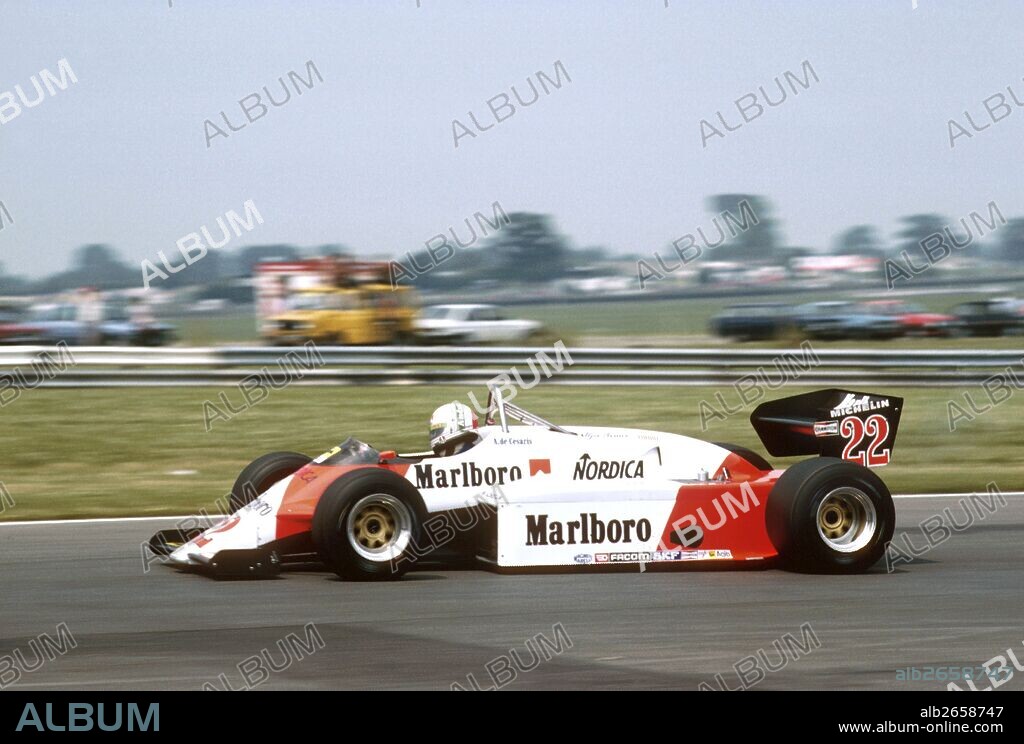 Andrea de Cesaris, Italian driver whose family imported Marlboro cigarettes in Italy, sponsored his racing. Alfa Romeo 183T, British GP, Silverstone, England, 16 July 1983.
