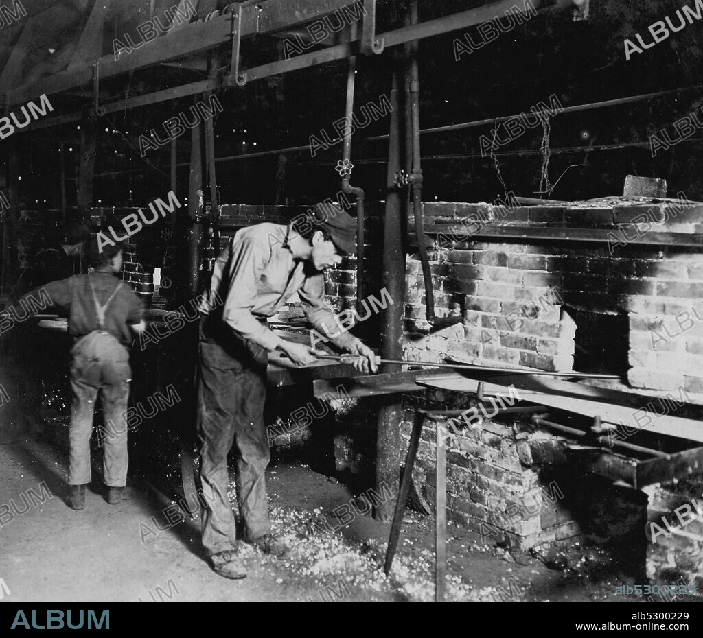 Putting Bottles into the Annealing Oven. An Indianapolis Glass Works, 1 AM.