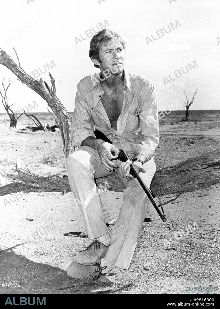 GARY BOND in WAKE IN FRIGHT, 1971, directed by TED KOTCHEFF. Copyright UNITED ARTISTS.