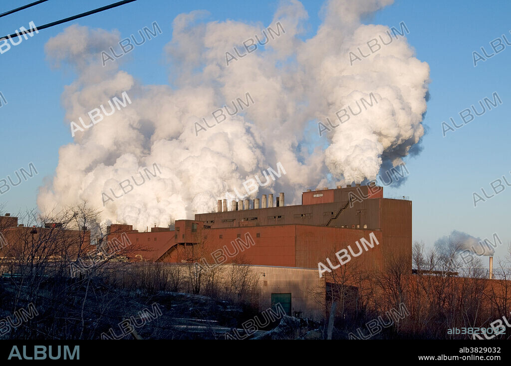 Exhaust coming from Northshore Mining Company, a Taconite processing facility in Silver Bay, Minnesota, North America. Taconite is a low-grade iron ore. 2008 Production was 5.5 million ton processed through this plant.